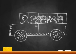 Drawing of school bus on blackboard